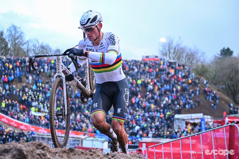 World champion Mathieu van der Poel leads the way out of the arena-like sand bowl at World Cup Zonhoven.