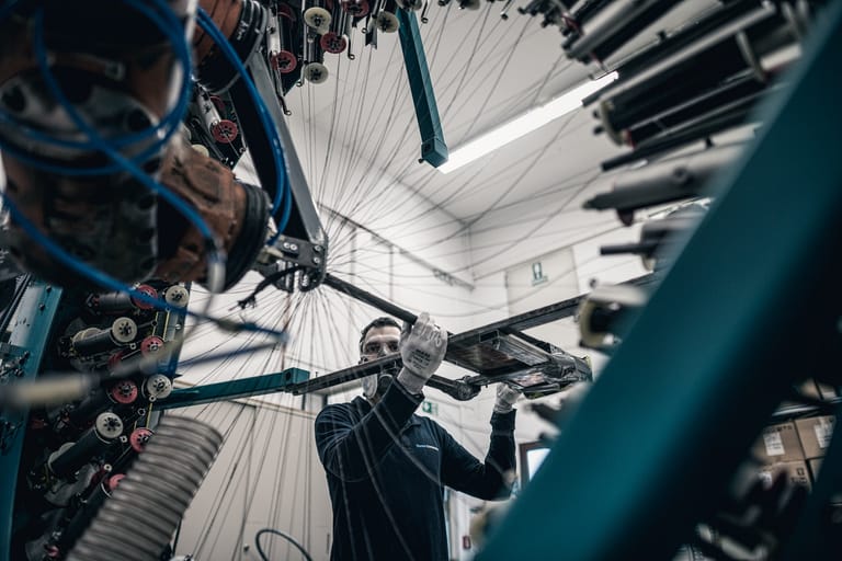 Hunt Sustain phase one factory image, carbon fibre stretched across the image